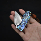 Miniature Damascus Steel Pocket Knife with Iridescent Abalone Shell Handle